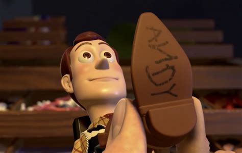 andy's father toy story|andy on woody's boot.